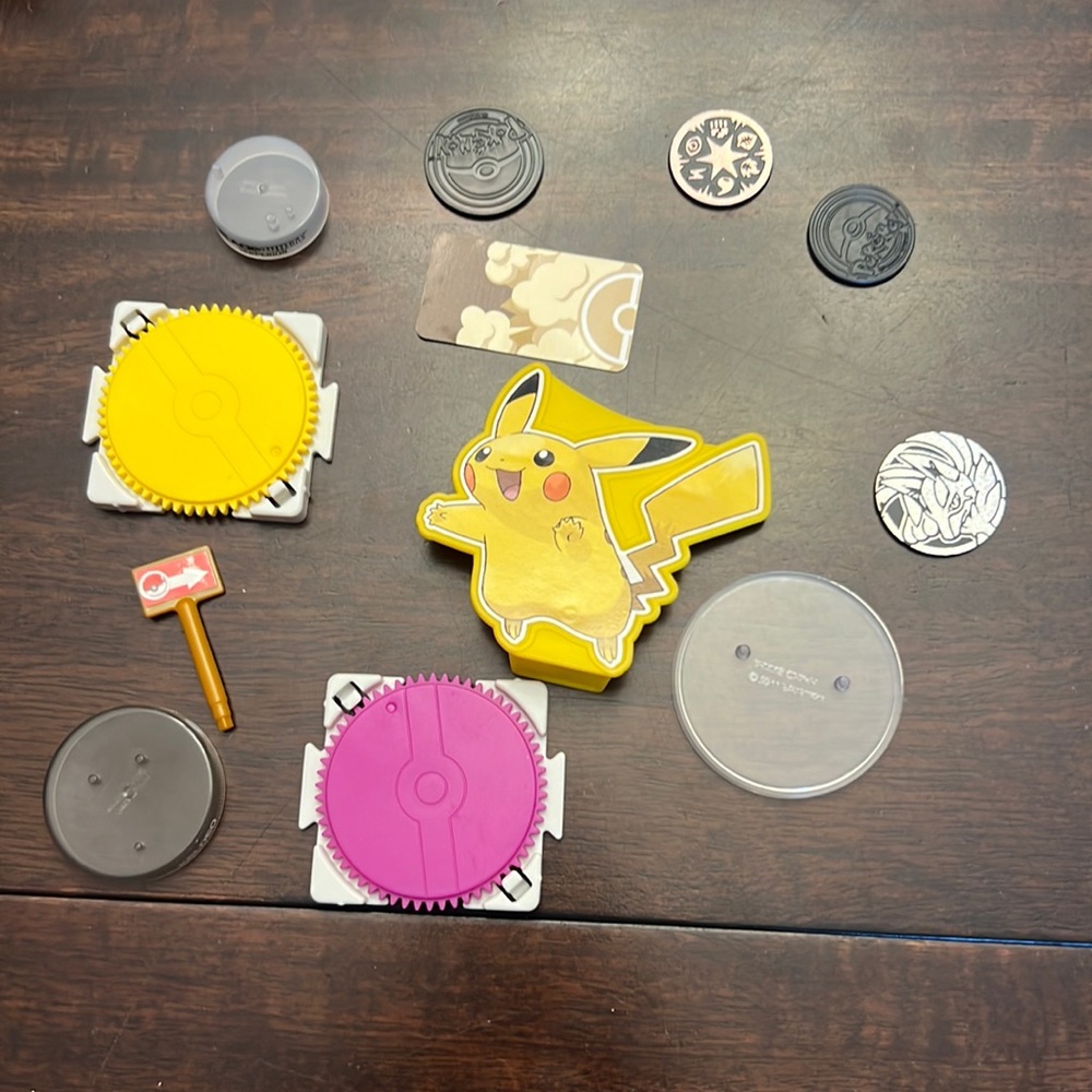 Misc pokemon stands coins etc as shown.
